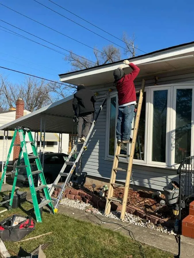 Restoration crew performing exterior repair in Sallisaw